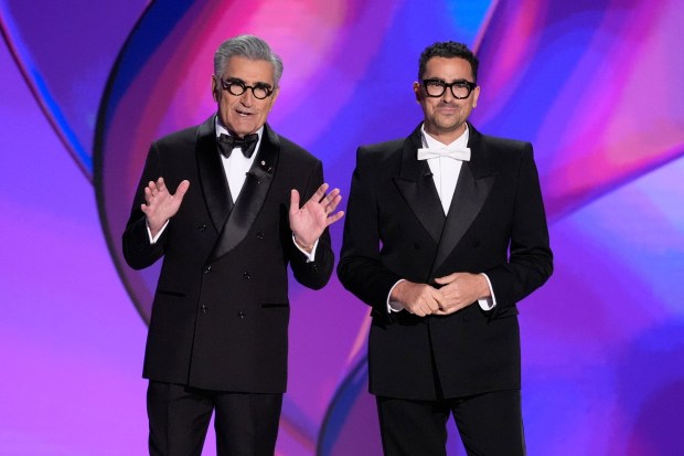 Hosts Eugene Levy and Dan Levy speak during the 76th Primetime Emmy Awards