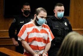 The father of a mentally ill man who killed 10 people at a Colorado supermarket testified Tuesday at his murder trial that he thought his son may have been possessed by an evil spirit before the attack.