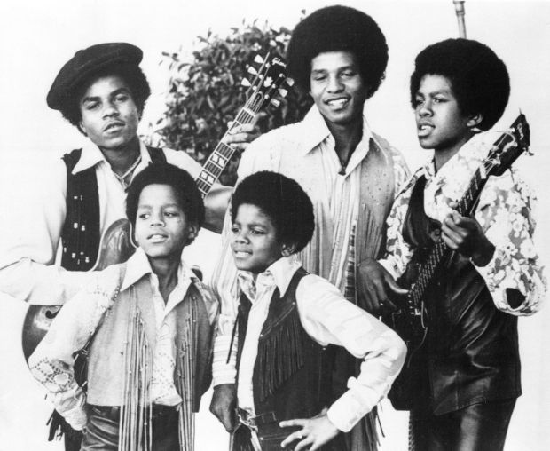 In this undated photo, the Jackson 5, Michael Jackson, front right, Marlon Jackson, front left, Tito Jackson, back left, Jackie Jackson and Jermaine, back right, are shown in Los Angeles. (AP)