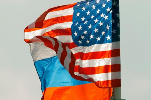 FILE – U.S. and Russian national flags wave on the wind in Moscow’s Vnukovo airport, Russia, April 11, 2017 to welcome a U.S. dignitary. (AP Photo/ Ivan Sekretarev, file)

