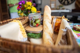 The interior of a picnic basket is seen as it sits on display