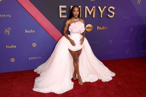 Aja Naomi King attends the 76th Primetime Emmy Awards
