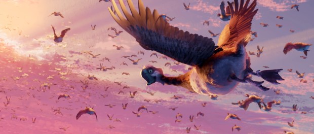 Longneck, voiced by Bill Nighy, leads a goose migration in a scene from "The Wild Robot." (Courtesy of Universal Pictures and DreamWorks Animation)