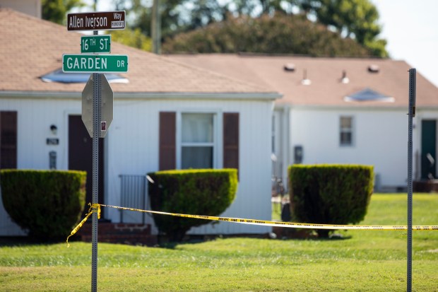 The area around the 1200 block of 16th St. and Garden Dr. near the Stuart Gardens apartments in Newport News is marked off by police tape due to a shooting that left a 15-year-old Menchville student dead on Tuesday, Sept. 10, 2024. According to police, a ShotSpotter alert prompted officers to go to the area just after 6:15 a.m. where the student was then located. (Kendall Warner / The Virginian-Pilot)
