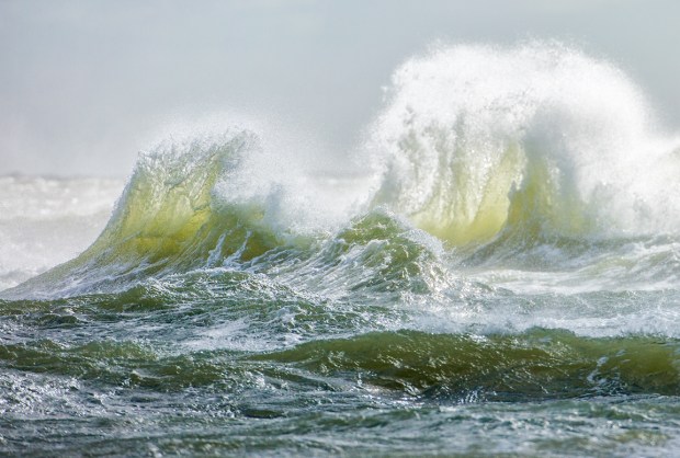 An exhibit of Ray Matthews work includes waves colliding at Cape Hatteras. (Photo courtesy Bryan Cultural Series)